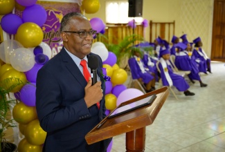 Custos of Manchester, Garfield Green, addresses the Yabnel Preparatory & Care Centre graduation ceremony held on Thursday (June 27) at the Apostolic Church of Jamaica, Goodness & Mercy Temple in Manchester.