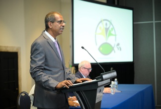 Chief Executive Officer of the National Fisheries Authority, Dr. Gavin Bellamy, makes a presentation at the closing-out workshop for the Pilot Programme for Climate Resilience Jamaica (PPCR) Project in Jamaica, held on Thursday (May 30), at The Jamaica Pegasus hotel in New Kingston.