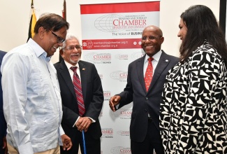 Minister of Industry, Investment and Commerce, Hon. Aubyn Hill (second right), shares a light moment with (from left) Chairman, Standards Council, Jamaica Bureau of Standards, Wilfred Baghaloo; High Commissioner of Trinidad and Tobago to Jamaica, His Excellency Deryck L. Murray; and President of the Trinidad and Tobago Chamber of Industry and Commerce, Kiran Maharaj. Occasion was the opening ceremony for the Chamber’s Trade Mission Jamaica 2024, at The Jamaica Pegasus hotel, New Kingston, on June 26.

