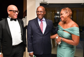 Minister of Industry, Investment and Commerce, Senator the Hon. Aubyn Hill (centre) shares a light moment with incoming President of the Rotary Club of Kingston, Sixto Coy (left) and his wife, Chief Executive Officer, GK Foods International Business, Andrea Coy. Occasion was the Rotary Club of Kingston’s Installation Ceremony and Banquet on June 27 at The Jamaica Pegasus hotel in Kingston.