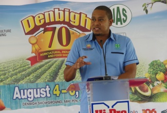 Minister of Agriculture, Fisheries and Mining, Hon. Floyd Green addresses the launch of the Denbigh Agricultural, Industrial and Food Show, held on June 21, at Hi-Pro Ace Supercentre, in White Marl, St. Catherine.