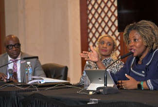 Minister without Portfolio in the Office of the Prime Minister with responsibility for Information, Skills and Digital Transformation, Dr. the Hon. Dana Morris Dixon (right) makes a point during a breakout session of the 10th Biennial Jamaica Diaspora Conference held at the Montego Bay Convention Centre in St. James on June 18. Listening (from left) are Head of Communications and Corporate Affairs at Digicel Jamaica, Elon Parkinson and Managing Director of the HEART/NSTA Trust, Dr. Taneisha Ingleton. The breakout session discussed the topic ‘Skills training at the cornerstone of national development through HEART/NSTA Trust’.

