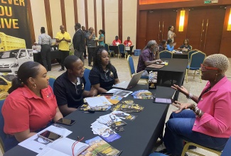 Aspiring business owner, Denise Russell (right), receives advice on public liability insurance from the Marathon Insurance Brokers team (from left) Team Lead, Rashque Rowe; Sales Executive, Keishan Campbell; and Account Executive, Sueyen Thomas. Occasion was the Tourism Product Development Company (TPDCo) Licensing Expo on Tuesday, June 11 at the Montego Bay Convention Centre in St James.