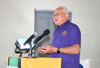 Justice Minister, Hon. Delroy Chuck, addresses a recent Social Justice Tour town hall in St. Elizabeth.

