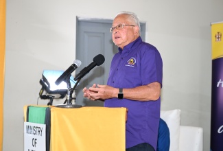 Justice Minister, Hon. Delroy Chuck, addresses the Social Justice Tour town hall, held at the St. Mathews Anglican Church in Santa Cruz, St. Elizabeth on June 13.