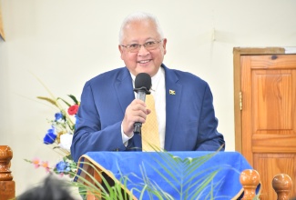 Minister of Justice, Hon. Delroy Chuck, addresses the Ministry’s Alternative Justice church service, which was held at the Williamsfield Seventh-day Adventist Church in St. Elizabeth on June 15.

