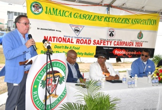 Minister of Science, Energy, Telecommunications and Transport, Hon. Daryl Vaz, delivers the main address at the Jamaica Gasolene Retailers Association (JGRA) Road Safety Month launch, held on Wednesday (June 5), at the TotalEnergies Service Station in Portmore Pines, St. Catherine. This month is being observed under the theme ‘Don’t be a fool, respect the road-safety rules’.