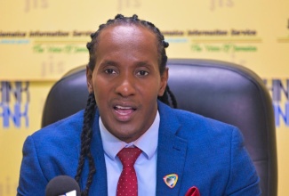 Minister of State in the Ministry of Foreign Affairs and Foreign Trade, Hon. Alando Terrelonge, speaks at a JIS Think Tank on June 6.