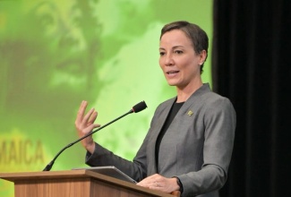 Minister of Foreign Affairs and Foreign Trade, Hon. Kamina Johnson Smith, addresses delegates attending the 10th Biennial Jamaica Diaspora Conference at the Montego Bay Convention Centre in Rose Hall, St. James, on Wednesday (June 19).