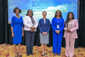 Minister of Foreign Affairs and Foreign Trade, Senator the Hon. Kamina Johnson Smith (centre), shares a moment with (from left) President, Jamaican Women of Florida, Aisha Rainford; High Commissioner of Jamaica to Canada, Marsha Coore Lobban; Ambassador of Jamaica to Belgium and Head of Mission to the European Union (EU), Symone Betton Nayo; and Consul General of Jamaica to New York, Alsion Wilson.  Occasion was a panel discussion during the 10th Biennial Diaspora Conference at the Montego Bay Convention Centre in St. James on June 17.

