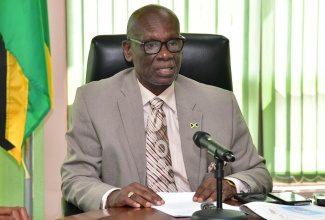 Local Government and Community Development Minister, Hon. Desmond McKenzie, addresses a National Disaster Risk Management Council (NDRMC) meeting at the Ministry’s offices in Kingston on Monday (July 1).