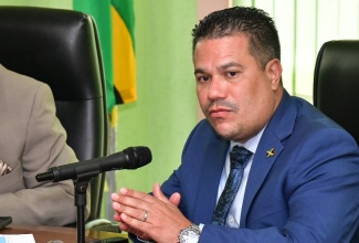 Minister without Portfolio in the Ministry of Economic Growth and Job Creation, Senator the Hon. Matthew Samuda, addresses Monday’s (July 1) National Disaster Risk Management Council meeting at the Ministry of Local Government and Community Development in Kingston.

