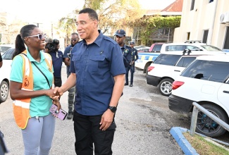 Prime Minister, the Most Hon. Andrew Holness, is greeted by Coordinator for Disaster Preparedness at the St. Elizabeth Municipal Corporation, Ornella Lewis, while touring St. Elizabeth on Thursday, July 4, to assess damage caused by Hurricane Beryl.


