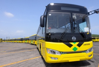 The new Jamaica Urban Transit Company (JUTC) buses arrive at the Portmore Depot in St. Catherine on Monday (July 15), after being cleared at Kingston Wharves. A total of 100 compressed natural gas (CNG) buses were acquired by the Government to strengthen the JUTC fleet.