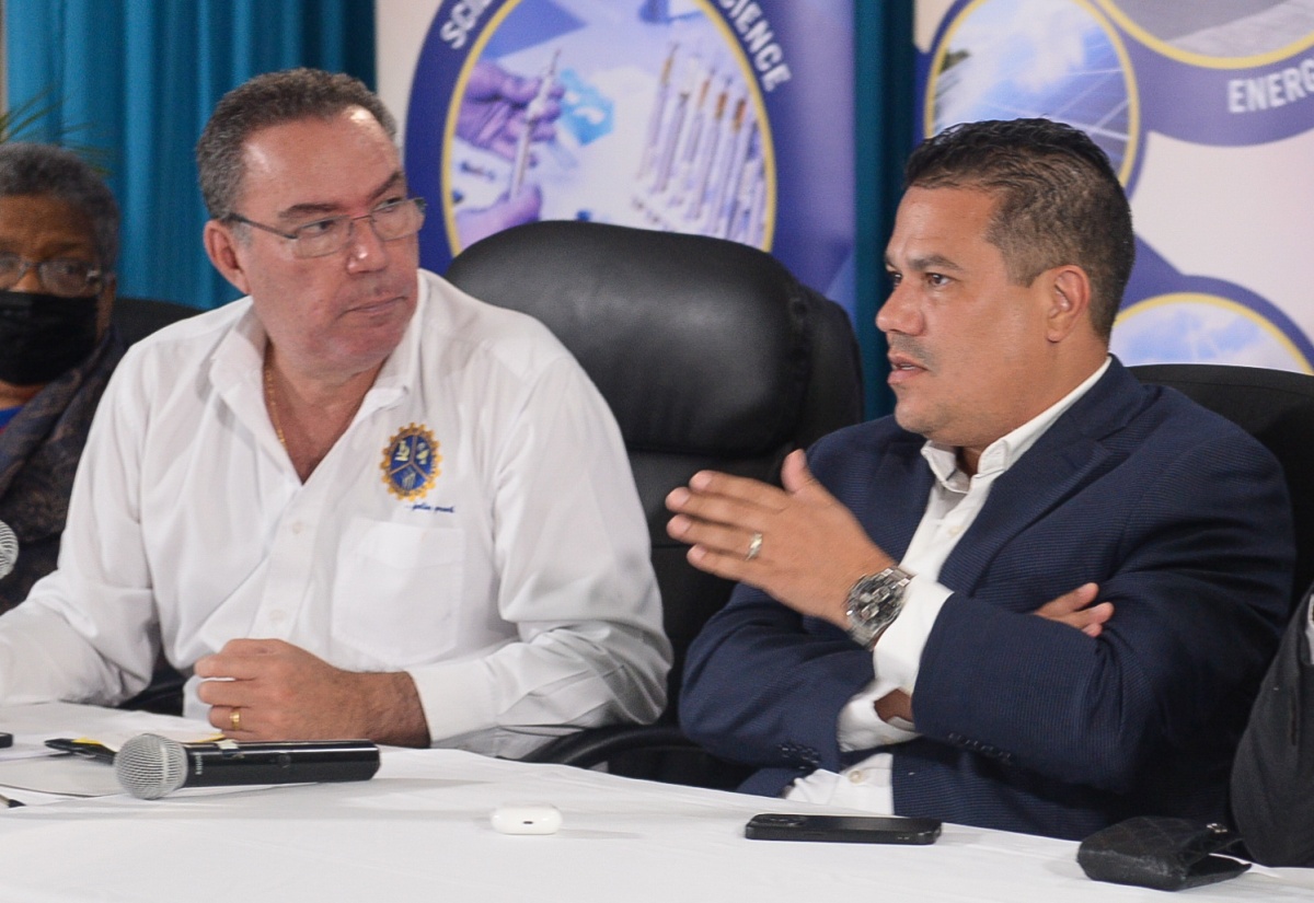 Minister of Science, Energy, Telecommunications and Transport, Hon. Daryl Vaz (left), and Minister Without Portfolio in the Ministry of Economic Growth and Job Creation, Senator the Hon. Matthew Samuda, converse during a press conference at the Petroleum Corporation of Jamaica (PCJ) in New Kingston on Friday (July 5) to provide an update on the restoration of utilities affected by Hurricane Beryl.