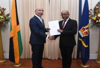 Governor-General, His Excellency the Most Hon. Sir Patrick Allen (left), presents a Proclamation declaring July as Dispute Resolution Month to Dispute Resolution Foundation (DRF) Board Chairman, John Bassie, during a recent courtesy call at King’s House.