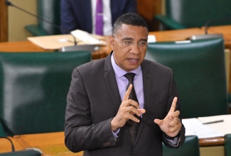 Prime Minister, the Most Hon. Andrew Holness, emphasises a point as he addresses the House of Representatives on July 16.

