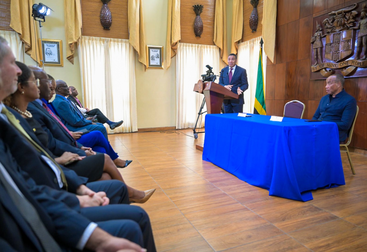 Prime Minister, the Most Hon. Andrew Holness (at the podium), addresses Monday’s (July 8) launch of the ‘Building a Better Jamaica Fund’ at Jamaica House. Seated (at right) is National Commercial Bank (NCB) Financial Group Chairman, Michael Lee-Chin.

