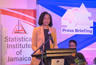 Director, Surveys Division, Statistical Institute of Jamaica (STATIN), Dr. Natalee Simpson, makes a presentation during Wednesday’s (July 17) STATIN Media Launch of the Revised Labour Force Survey and Press Briefing, at The Jamaica Pegasus hotel in New Kingston.

