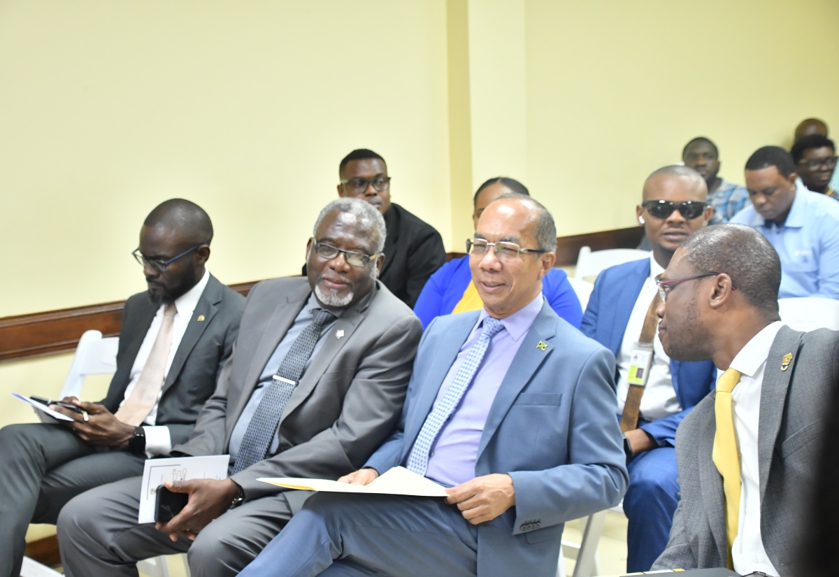 Deputy Prime Minister and Minister of National Security, Hon. Dr. Horace Chang ( second right), converses with Custos Rotulorum for St. James, Bishop the Hon. Conrad Pitkin (second left), and University of Technology (UTech) President, Dr. Kevin Brown (right), during the UTech Western Campus’ recent Science, Technology, Engineering and Mathematics (STEM) Summer Camp launch. The event was held at the campus in Montego Bay, St. James. At left is Montego Bay Chamber of Commerce and Industry (MBCCI) President, Oral Heaven.