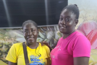 Sisters, Latoya (left) and Tashana Newell, farmers in Ramble, St. Thomas.