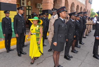 Custos of St. Catherine, Hon. Icylin Golding (centre), inspects uniformed groups at the Independence Day Flag Raising and Civic Ceremony held on the grounds of Emancipation square, Spanish Town, St. Catherine today (August 6).