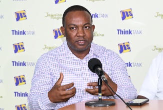 Head of the Department of Paediatrics at the Savanna-la-Mar Public General Hospital, Dr. Ludrick Morris, addresses a Jamaica Information Service (JIS)