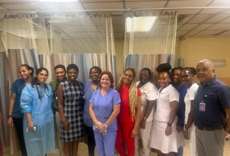 Consultant Emergency Physician at the Kingston Public Hospital (KPH), Dr. Hugh Wong (right), with members of the hospital’s Accident and Emergency team. This year, the KPH is celebrating 248 years of service to Jamaica’s public health sector.