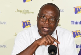 Western Regional Health Authority (WRHA) Health Promotion and Education Officer for Westmoreland, Gerald Miller, addresses a Jamaica Information Service (JIS)