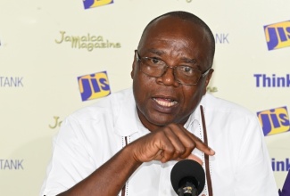 Western Regional Health Authority (WRHA) Health Promotion and Education Officer for Westmoreland, Gerald Miller, addresses a Jamaica Information Service (JIS) 