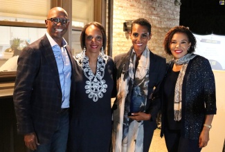 Jamaica’s Ambassador to the United States, Her Excellency Audrey Marks (right), shares a special moment with the 2024 JHUAN's IMPACT awarded Jamaican architect, Isiaa Madden (second right), who was recognised as an exemplary Howard Alumni for distinction in professional achievements, leadership qualities, and service to her community. Also sharing in the occasion are (from left) Chairman of the Jamaica Howard University Affinity Network (JHUAN), Don Christian, and JHUAN’s executive member, Dr Jacquelin Watson. Ms. Madden received her award at the organisation's sixth HUes of Blue fundraising event held on Saturday, September 21, at the Ambassador’s residence in Maryland.