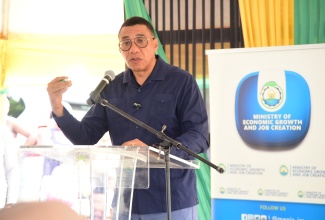 Prime Minister, Dr. the Most Hon. Andrew Holness, delivers the main address during the contract signing and ground-breaking ceremony for the Spicy Grove Infrastructure Works Project in Oracabessa, St. Mary, on Wednesday September 25.