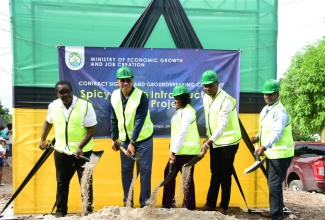 Prime Minister, Dr. the Most Hon. Andrew Holness (second left), officially breaks ground for the Spicy Grove Infrastructure Works Project in Oracabessa, St. Mary, on Wednesday (September 25). Also participating are (from left) Member of Parliament for St. Mary Western, Robert Montague; Permanent Secretary in the Ministry of Economic Growth and Job Creation, Arlene Williams (second right); Mayor of Port Maria, Councillor Fitzroy Wilson, and Managing Director for Southland Construction Limited, which will undertake the project, Raynard Hudlin.

