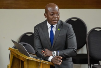 Minister of Labour and Social Security, Hon. Pearnel Charles Jr., makes a statement to the House of Representatives on Tuesday (September 17).

