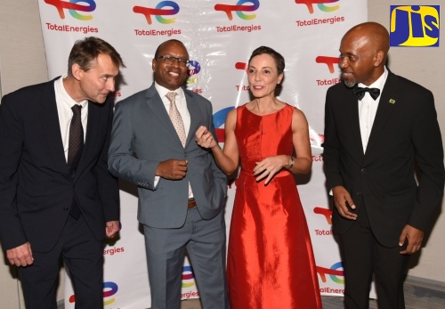 Minister of Foreign Affairs and Foreign Trade, Senator the Hon. Kamina Johnson Smith (second right), makes a point while at TotalEnergies Marketing Jamaica’s 20th Anniversary Gala, held at the AC Mariott Hotel in New Kingston, on September 5. Listening (from left) are Deputy Senior Vice President (Americas), TotalEnergies; Pierre-Emmanuel Bredin; Managing Director of Petrojam Limited, Telroy Morgan, and Chief Technical Director in the Ministry of Science, Energy, Telecommunications and Transport, Bryan Richardson.