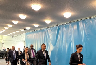 Prime Minister, Dr. the Most Hon. Andrew Holness (2nd right), arrives at the United Nations (UN) headquarters in New York this morning (Sept. 21) to address the opening of the Summit of the Future Action Day 2, which coincides with International Day of Peace. He is accompanied by Minister of Foreign Affairs and Foreign Trade, Senator the Hon. Kamina Johnson Smith (third right). Action Day 2 focusses on three priority themes: A Digital Future for All; A Peaceful Future for All; and A Sustainable Future for All.  The Action Days, from September 20 to 21, bring together representatives from Member States, civil society, private sector, academia, local and regional authorities, youth, and many more, for broad engagement and inclusion. Prime Minister Holness is participating in the 79th United Nations General Assembly (UNGA) under the theme: ‘Unity in Diversity: for the advancement of peace, sustainable development, and human dignity for everyone.’