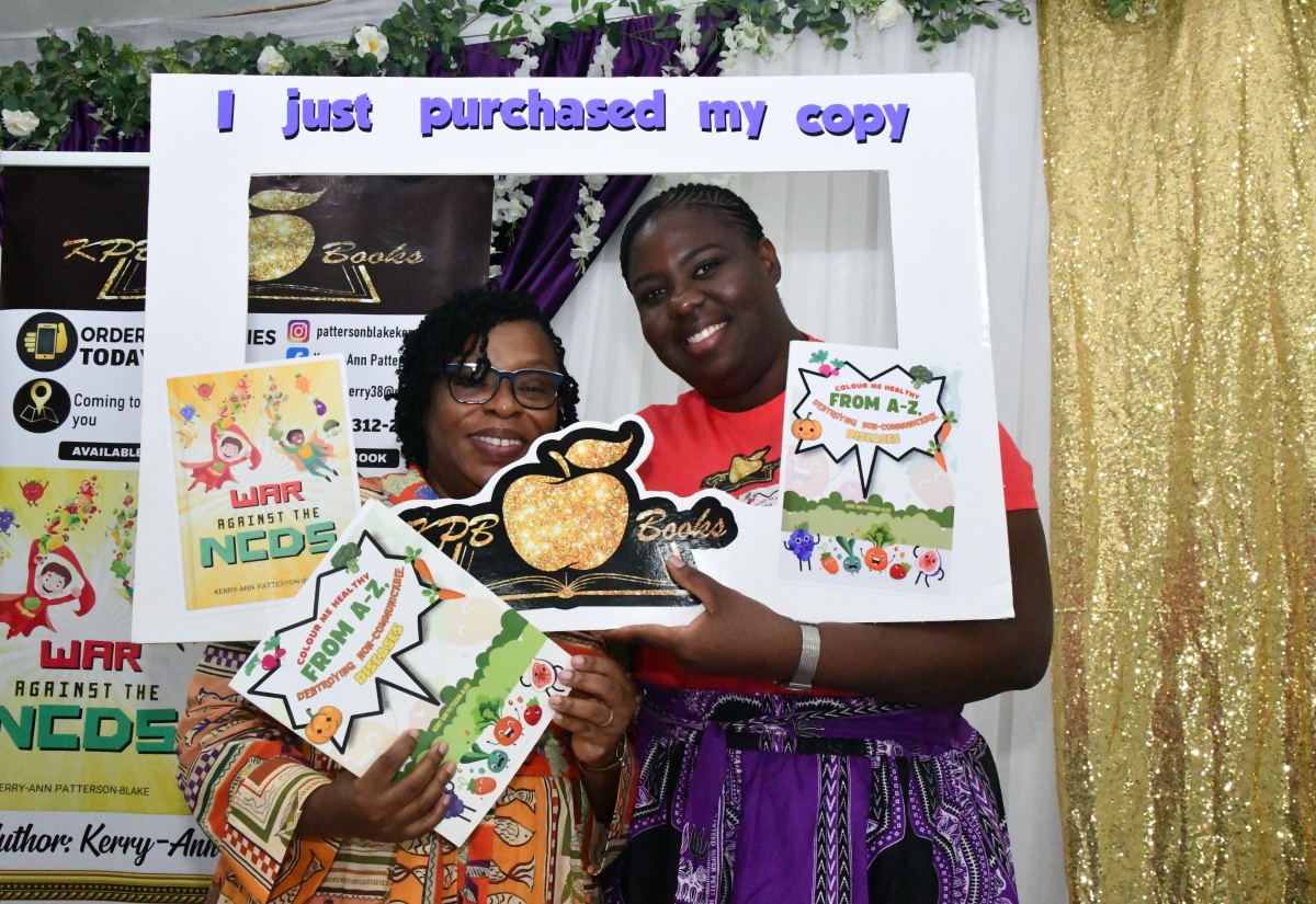 Health Promotion and Education Officer for St. Ann and author, Kerry-Ann Patterson-Blake (right), poses for a photo with Paediatrician at the St. Ann’s Bay Regional Hospital, Dr. Keisha Livingstone Sinclair. The occasion was the recent launch of Mrs. Patterson-Blake’s book, ‘War Against the NCDs’, at the Holiday Haven Resort in St. Ann.

