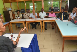 Minister of Education and Youth, Hon. Fayval Williams (foreground), is briefed on developments at Yallahs High School in St. Thomas by Principal, Mark Malabver, during a meeting with members of the institution’s leadership on Wednesday (September 4). Also listening is Member of Parliament for St. Thomas Western, James Robertson (third left).

