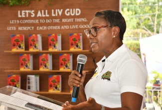 Minister of State in the Ministry of National Security, Hon. Juliet Cuthbert-Flynn, speaking at the launch of the ‘Let’s All Liv Gud’ activity book at Curphey Place in Kingston in May 2024.

