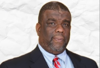 Mr. Errol C. Greene, OD, JP. 