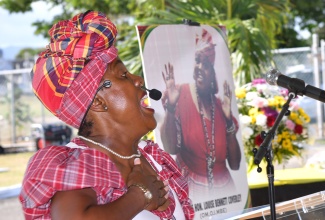 Actress Deon Silvera performs an item at a floral tribute to commemorate the 105th anniversary of the birth of cultural icon, Dr. the Hon. Louise Bennett Coverley at National Heroes Park in Kingston on September 7. Miss Lou, who was born on September 7, 1919, passed away on July 26, 2006 in Canada.