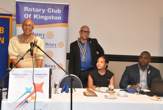 Minister of Education and Youth, Hon. Fayval Williams (left), delivers the keynote address during Thursday’s (September 26) Rotary Club of Kingston luncheon meeting held at The Jamaica Pegasus hotel in New Kingston. Looking on are members of the club’s executive (from second left) President, Sixto Coy; Secretary Sasha Innis; and Sergeant at Arms, Karsten Johnson.

