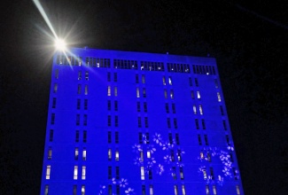 The Office Centre Building, which houses the corporate offices of the  Maritime Authority of Jamaica (MAJ), illuminated with blue lights on World Maritime Day (WMD) 2023.
