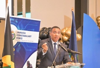 Prime Minister, the Most Hon. Andrew Holness, emphasies a point while addressing the retirement function for Deputy Commissioner of Police (DCP), Fitz Bailey, held recently at the AC Mariott Hotel in New Kingston.

