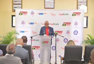 Postmaster General, Lincoln Allen, speaking during the Liguanea Post Office reopening and rebranding ceremony in St. Andrew on Tuesday (September 17).

