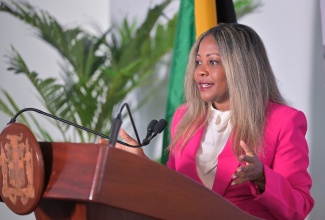 Minister without Portfolio in the Office of the Prime Minister, with responsibility for Skills, Digital Transformation and Information, Senator Dr. the Hon. Dana Morris Dixon, addresses a post-Cabinet press briefing at iTel’s corporate office in St. Andrew, on September 18.