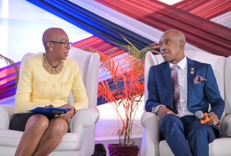 Minister of Education and Youth, Hon. Fayval Williams, converses with Caribbean Maritime University (CMU) President, Professor Andrew Spencer, during a Media Day press briefing at the institution’s main campus at Palisadoes Park in Kingston, on Monday (September 23).