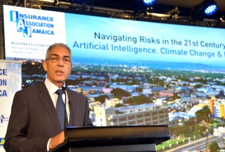 Bank of Jamaica (BOJ) Governor, Richard Byles, addresses the inaugural Insurance Association of Jamaica (IAJ) business conference at The Jamaica Pegasus hotel in New Kingston on Wednesday (September 11).