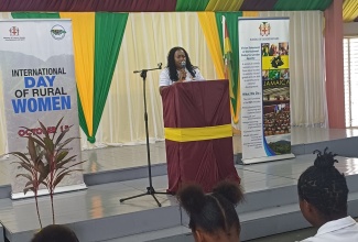 Acting Director for the Community Liaison Unit at the Bureau of Gender Affairs, Nardia McLaren, speaks at an International Day of Rural Women (IDRW) 2024 forum at the Portland-based College of Agriculture, Science and Education, on October 16.

