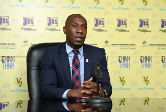 Assistant General Manager of Corporate Communications and Public Affairs at the National Housing Trust, Dwayne Berbick, speaks at a Jamaica Information Service Think Tank.

